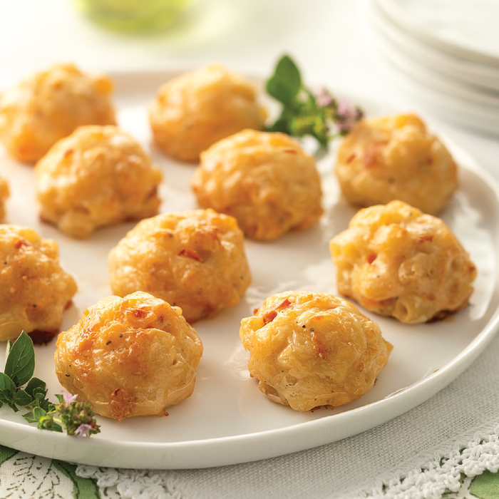 Lobster Mac and Cheese bites on a plate.