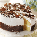 Tres Leche Cake with a slice removed